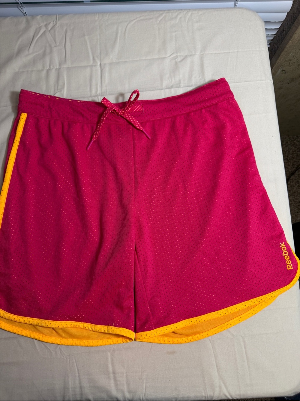 Reebok Women’s Hot Pink Athletic Shorts with Yellow Trim